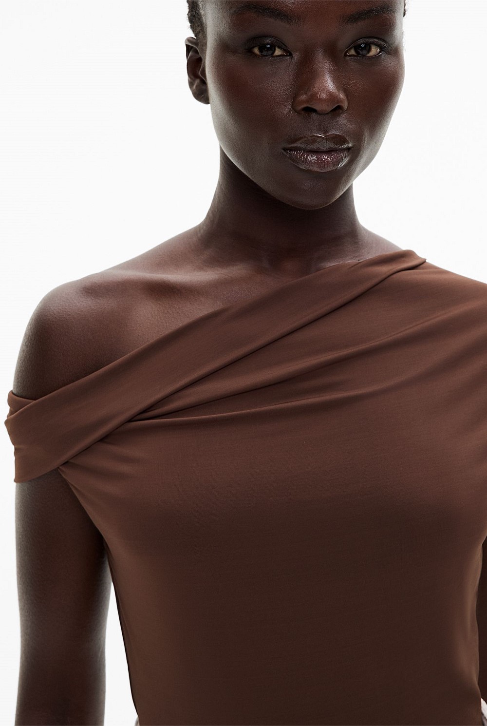 Asymmetric Twist Top